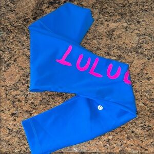 Never worn Electric Blue & Hot Pink Lululemon Ed Curtis Limited Edition Leggings